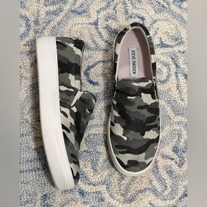 Steve Madden slip ons.